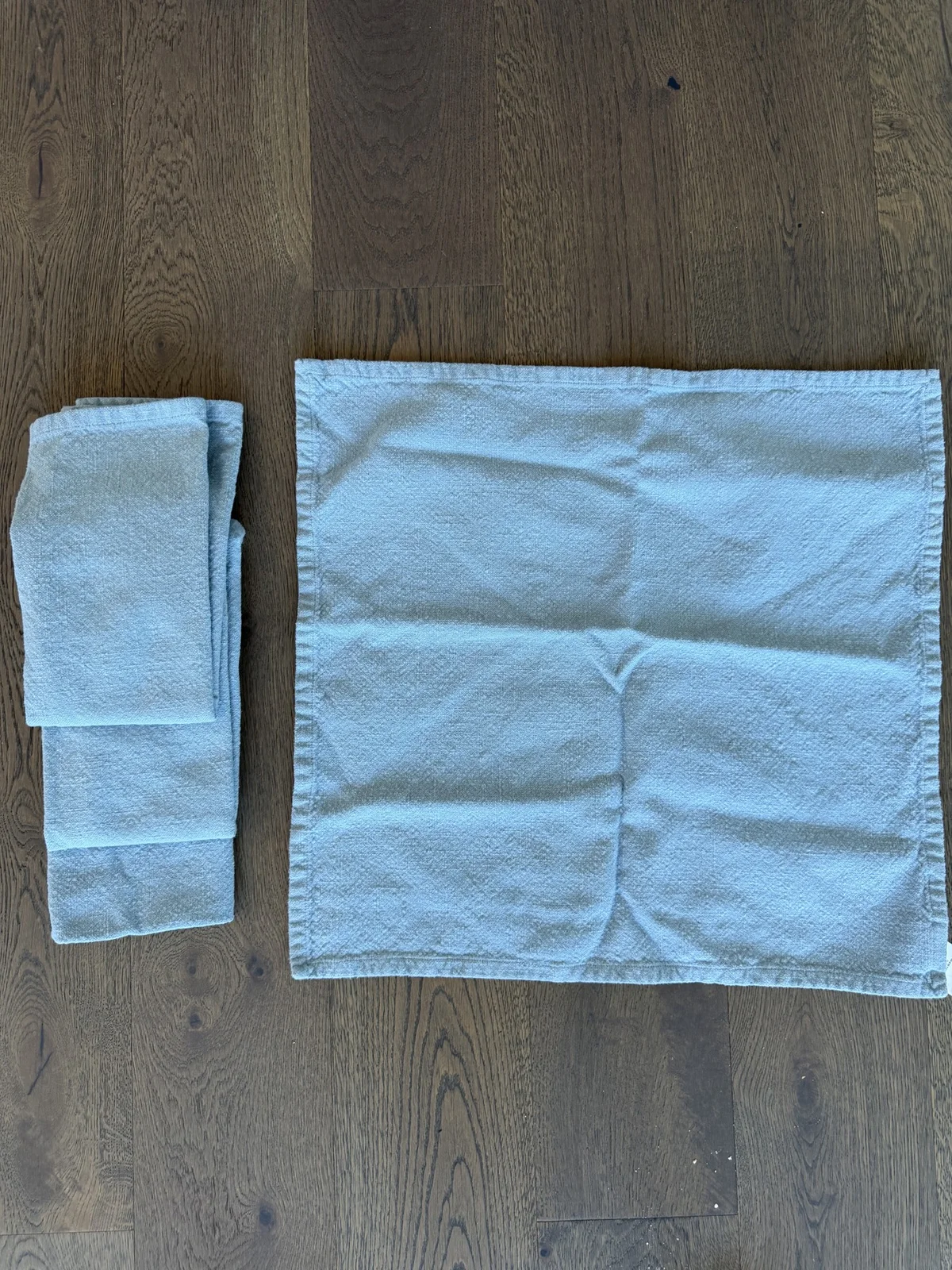Four West Elm Light Blue Cotton Napkins overall view